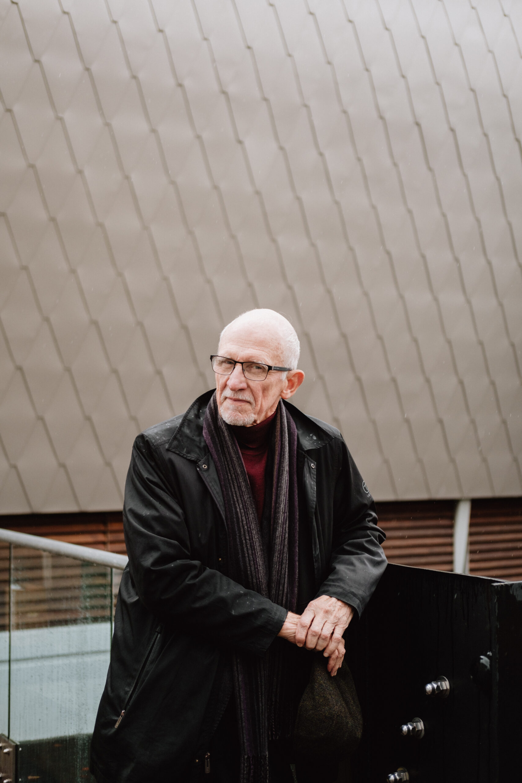A portrait of Roger Hughes.