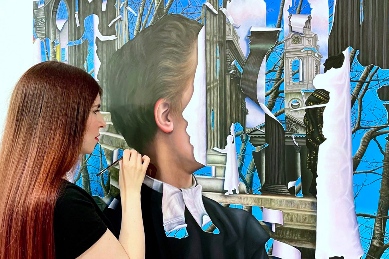 Cara Guri painting her final piece.