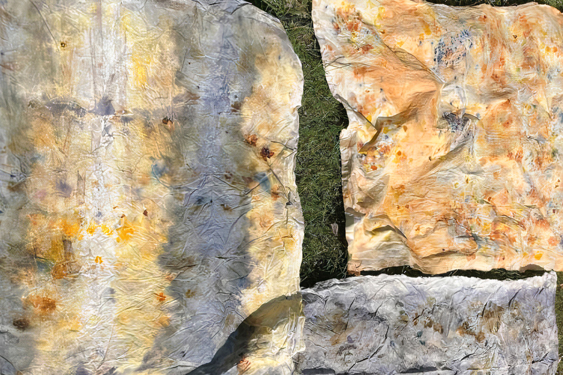 Alma Visscher's naturally dyed fabric panels drying in the sun.